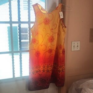 Cato Summer dress. NWT. Very vibrant with yellow, orange, and black. Summer!!